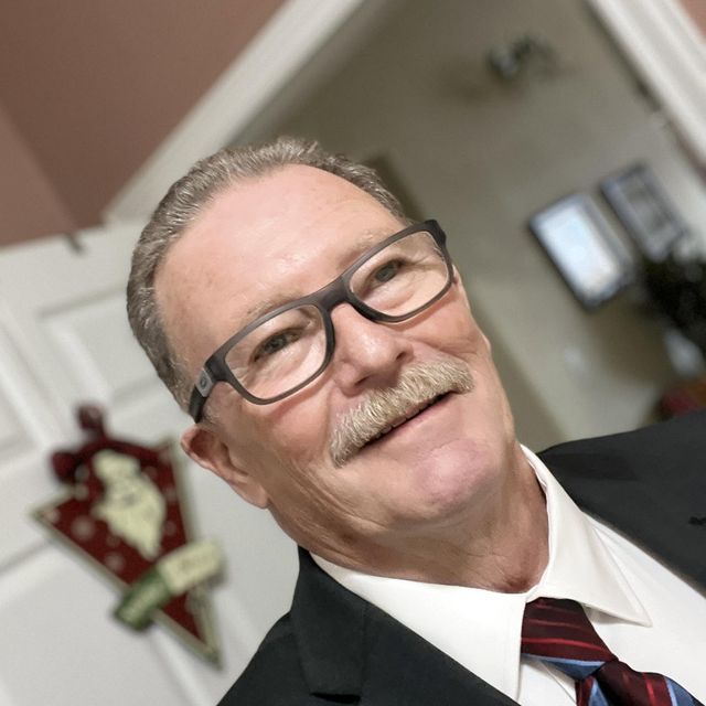 Co-owner of Red Dirt Autovisions, the father in a father and son auto detailing and window tint shop in Richfield, Utah